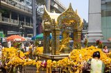 The Erawan Shrine, underneath the Chit Lom Skytrain station in Bangkok, represents the four-headed Hindu god of creation, Brahma (Phra Phrom), and was erected in 1956 after a series of fatal mishaps befell the construction of the original Erawan Hotel.<br/><br/>

Brahmā is the Hindu god (deva) of creation and one of the Trimūrti, the others being Viṣņu (Vishnu) and Śiva (Shiva). According to the Brahmā Purāņa, he is the father of Manu, and from Manu all human beings are descended. In the Rāmāyaņa and the Mahābhārata, he is often referred to as the progenitor or great grandsire of all human beings.